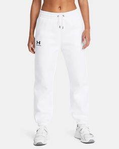 Women's UA Icon Fleece Joggers | Under Armour Cozy Cotton Activewear For Sports, Sporty White Joggers For Fall, Cozy Activewear With Ribbed Waistband For Sports, White Fleece Sweats For Sports, White Sweatpants For Sports In Fall, Sporty White Sweatpants For Fall, Sporty Sweats With Comfort Waistband In Fleece, Sporty Cotton Pants By Under Armour, Comfortable White Sports Joggers