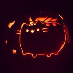 a pumpkin carved to look like a cat