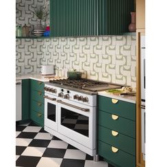 a green and white kitchen with an oven, counter tops, cabinets, and checkered flooring