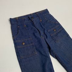 "Levis bush pants Childrens size 23\" waist cut off legs measure 9\" inseam Very cool only because theyre bush pants." Retro High Waist Bottoms With Five Pockets, Retro High Waisted Bottoms With Five Pockets, Retro Wide Leg Pants With Patch Pockets, Retro Wide-leg Bottoms With Patch Pockets, Retro Wide Leg Bottoms With Patch Pockets, Retro High Waist Cargo Jeans With Pockets, Retro High Waist Cargo Jeans, Vintage Mid-rise Jeans For Work, Retro High-waist Cargo Jeans With Pockets