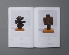 an open book with pictures of sculptures on it's cover and in the middle