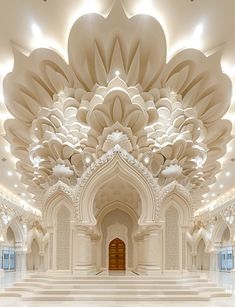 an elaborately designed room with white walls and ceilinging is featured in this image