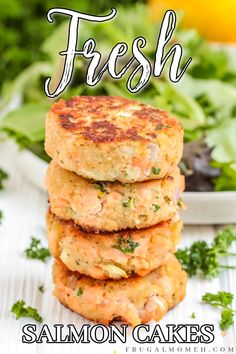 salmon cakes stacked on top of each other with fresh greens in the background and text overlay