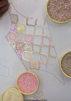 someone is working on some sequins in their crafting class at the arts and crafts school