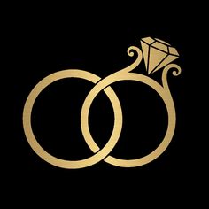 two gold wedding rings with a diamond on the top and bottom, against a black background