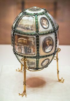 a decorative glass object with pictures on it