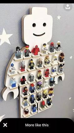 there is a lego wall hanging on the wall