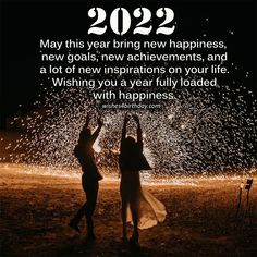 two women dancing in the rain with sparkles and new year's eve message