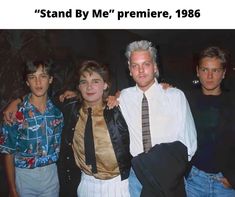 three men standing next to each other in front of a black background with the caption stand by me premiere, 1989