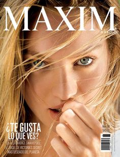 a magazine cover with a woman's face and hands on her chin, looking at the camera