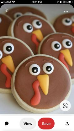 cookies decorated to look like turkeys with googly eyes