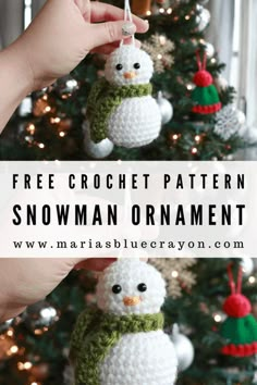 a crocheted snowman ornament hanging from a christmas tree with the words free crochet pattern