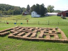 a large hay maze in the middle of a field