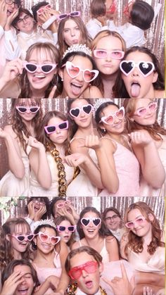 many people wearing heart shaped sunglasses and posing for a photo booth at a wedding reception