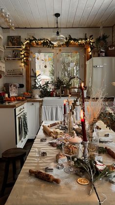 a table is set for christmas dinner in the kitchen