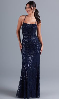 Simply gorgeous, this exciting long sequin prom dress is an exclusive style sold only at PromGirl. The fully-lined long formal dress has a sheer overlay that boasts a shimmering sequin pattern from the neckline to the hem of the curve-hugging long skirt. Supportive spaghetti straps round the shoulders before creating a statement by crossing the open back and tying into a bow. For a sparkly look at prom, fancy galas, and other black-tie formal events, slip into this luxurious statement-back long Blue Sparkly Prom Dress, Prom Dress Burgundy, Navy Prom Dresses, Long Formal Dresses, Dresses For Prom, Simply Dresses, Long Formal Dress, Look Plus Size, Blue Dress Formal