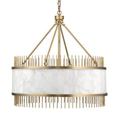 a chandelier with white and gold accents