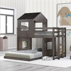 a child's bedroom with bunk beds and furniture