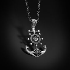 Silver Anchor Pendant with Compass, Ship Wheel Silver Nautical Anchor Necklace, 925k Sterling Mens Pendant, Father's Day Gift for Sailor Him Looking for a gift? You've found the perfect item for this! All our products are made in 925 sterling silver, the highest quality precious metal. In our workshop, everything is carefully handled in happy hands. A classic and beautiful necklace that will suit any style of clothing, everyday or event. Our products will be with you in every special moment! For any questions regarding this piece or our collection please reach out. We love talking to our customers. ITEM DETAILS GENDER : Male / Female MATERIAL : 925K Sterling Silver COLOR: Oxidized  Silver ◆ WEIGHT : 15 Grams ( ONLY PENDANT )  ◆ DIAMETER : 1,18 - 3,50 Cm  BAIL WIDTH : Suitable for up to 0.5 Classic Silver Anchor Jewelry, Gifts For Sailors, Anchor Pendant, Anchor Necklace, Ship Wheel, Nautical Jewelry, Nautical Anchor, Personalized Pendant, Mens Pendant