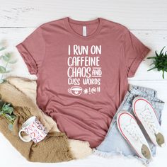 I Run On Caffeine Chaos And Cuss Word Graphic Tee Funny Sarcastic Graphic Tee Coffee Lovers Unisex Sizing Choose Your Size Choose Your Color Colors: Ocean Blue, Natural, Autumn, Silver, Berry Bella Canvas Tshirt, Bella Canvas Tee, Bella Canvas Shirt, Funny Graphic Tee, Coffee, Starbucks, Women's Tops, Womens Shirts, Women's Tshirt, Customized Tees, Customized Shirts, Customized Tshirts, Custom Tshirt, Custom Shirts, Custom Tees, Caffeine, Funny Sarcasm, Sarcastic, Graphic Tees, Camera Lover, Shirt Video, The Office Shirts, Mom And Sister, Gifts For Boss, Vacation Shirts, Video Editor, Boss Lady, Nicaragua