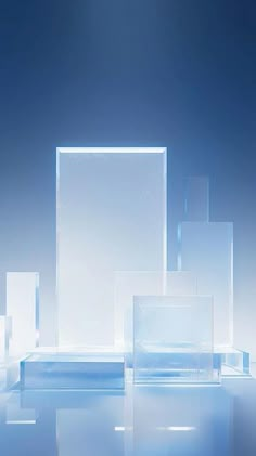 several glass blocks are stacked on top of each other in front of a blue background