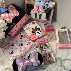 minnie mouse and other items are on the counter