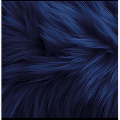 an animal fur texture that looks like it has been dyed in dark blue and is very soft