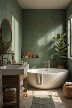 a bath tub sitting next to a window in a bathroom with green walls and flooring