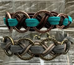 two different colored bracelets on top of each other