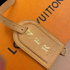 Louis Vuitton Monogrammed (Nfr0 Luggage Tag ..Euc. Comes In Original Lv Box. Purchase From Lv In Boca Raton Fl. Made In France Leather Monogram Bags For Travel, Tan Travel Bag With Monogram, Tan Monogram Travel Bag, Louis Vuitton Luggage Tag, Bag Names, France Colors, Bags Louis Vuitton, Gold Cream, Louis Vuitton Bags