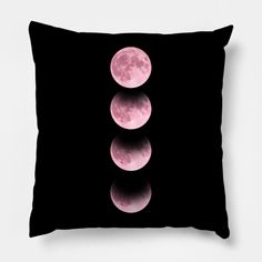 three phases of the moon in black and pink on a dark background with copy space