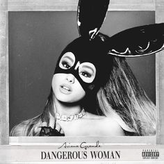 a woman wearing a bunny mask in front of a black and white photo with the words dangerous