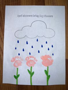 a child's drawing of flowers and rain