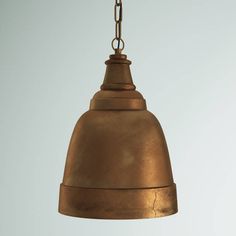 an old fashioned light hanging from a chain