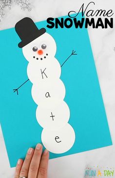 someone is making a snowman craft for kids