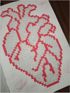 a piece of paper that has been made to look like a cross - stitch heart