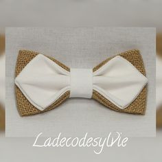 a white bow tie with burlap on it