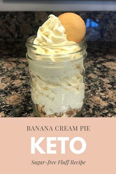 banana cream pie in a glass jar with whipped cream on top and the words, keto sugar - free fluffy recipe