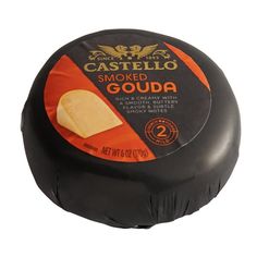 casteello smoked goutaa cheese on a white background