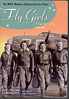 four women in flight uniforms standing next to an airplane