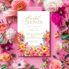 the floral bridal shower is surrounded by pink, yellow and white flowers on a pink background