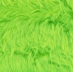 a bright green background that looks like fur