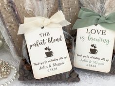 two wedding favors are sitting on a table