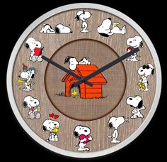 a clock with snoopy characters on it