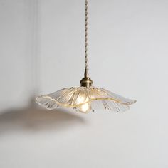 a light fixture hanging from a ceiling in a room