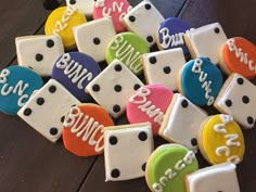 decorated cookies are arranged in the shape of dominos