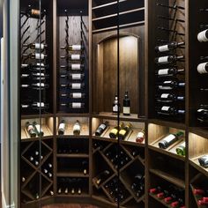 a wine cellar filled with lots of bottles