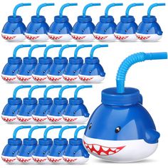 a blue and white shark shaped water bottle with lots of teeth