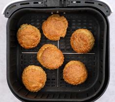 six baked goods sitting in an air fryer