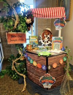 a boat made out of books and other items is on display at the children's book fair